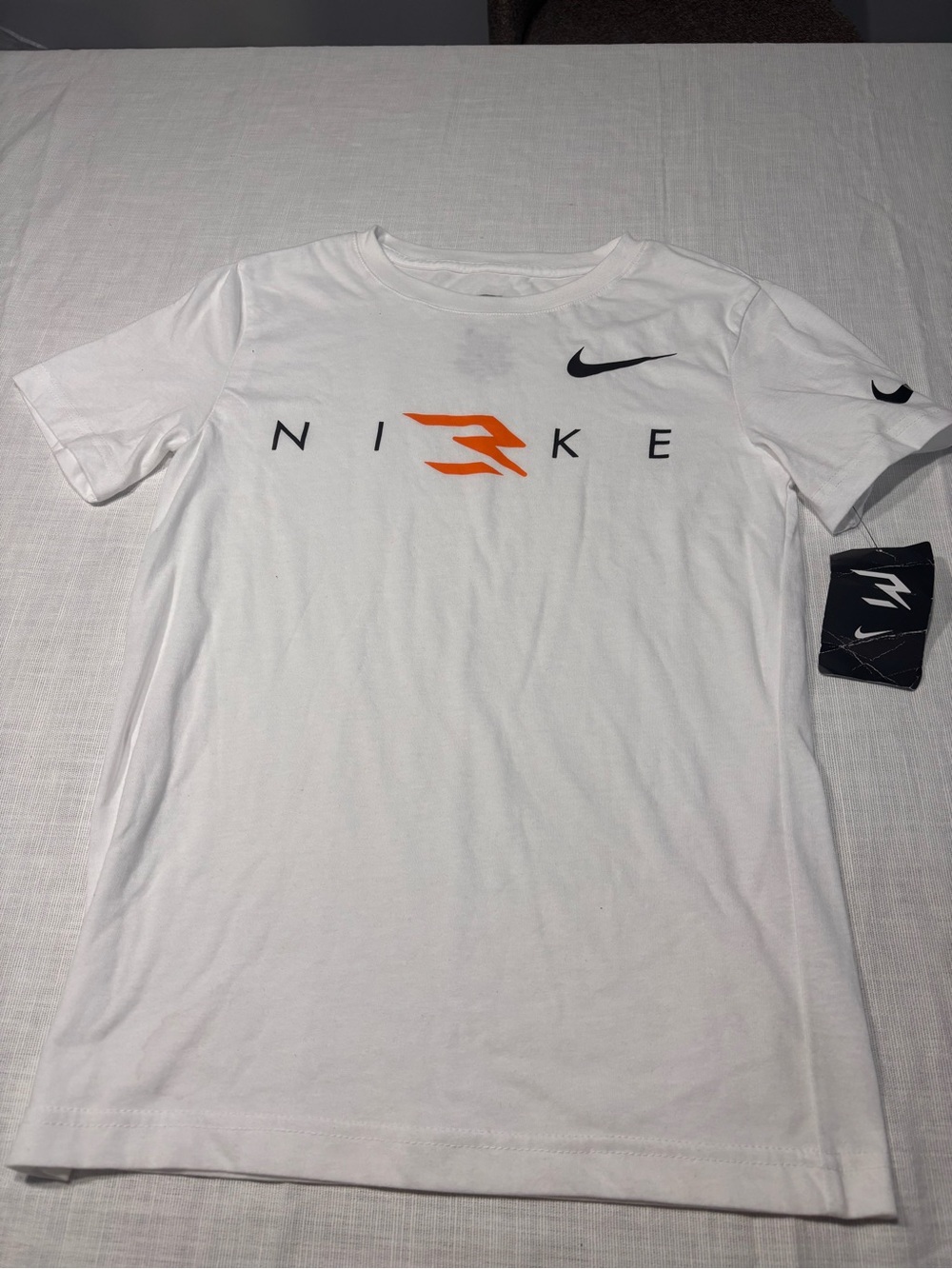 Nike White Short Sleeve Tee with Orange & Black Logo